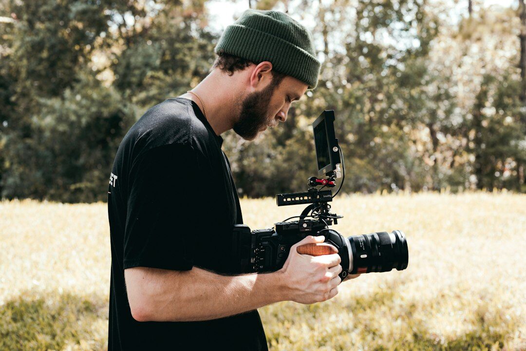 Studio portrait of a young Belgian man video journalist