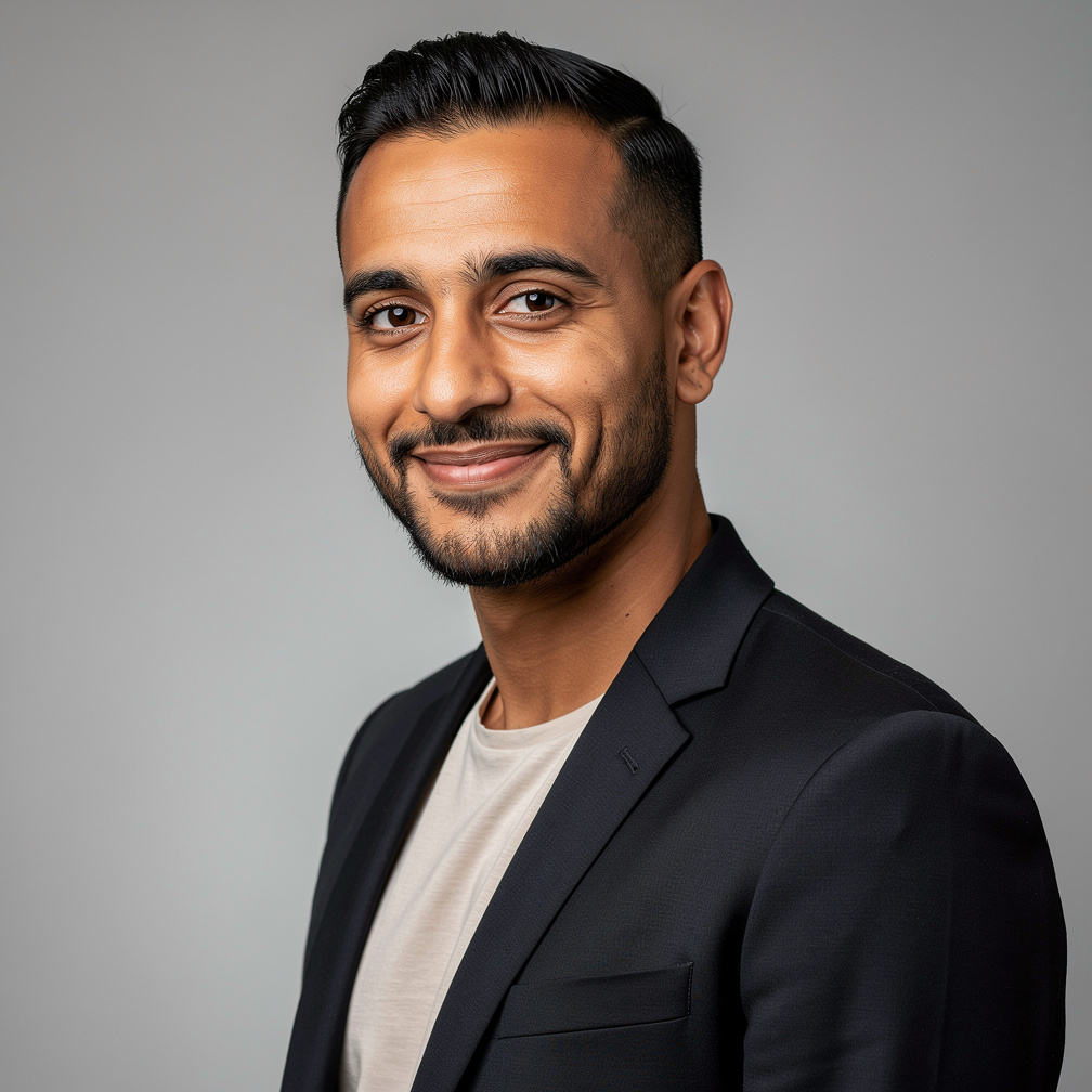 Studio portrait of a Belgian man of North African descent production manager